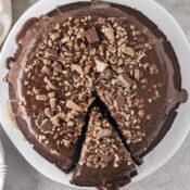 chocolate turtle cake from a box mix with one slice cut