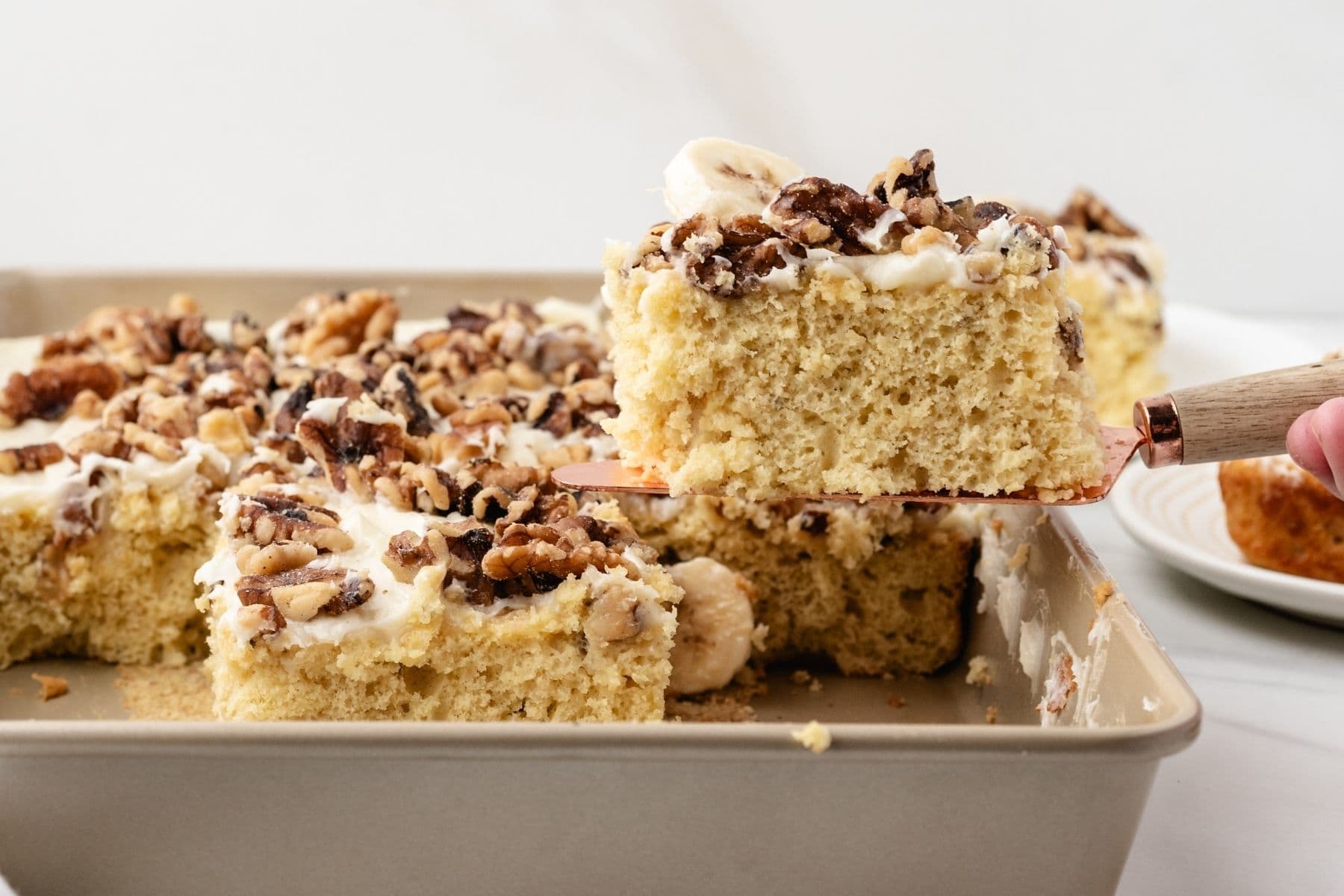 Banana cake slice with cream cheese frosting
