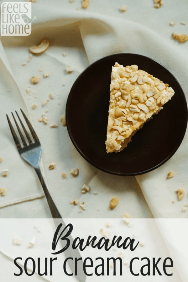 A plate of food with a fork and knife, with banana Cake