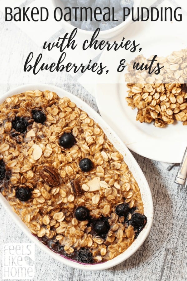 A baking dish filled with Oatmeal, cherries, blueberries, and nuts