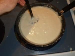 white bechamel sauce in a skillet