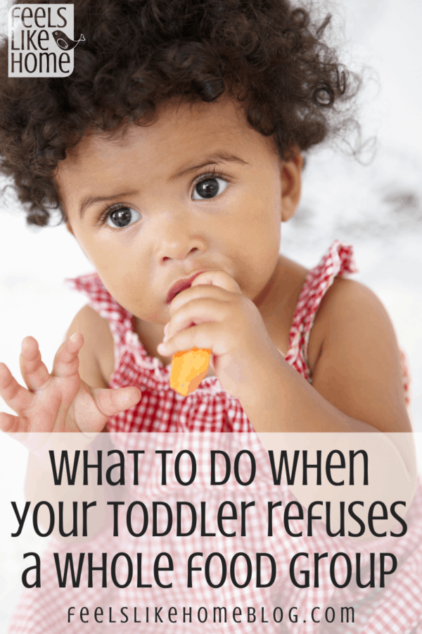 a toddler eating food