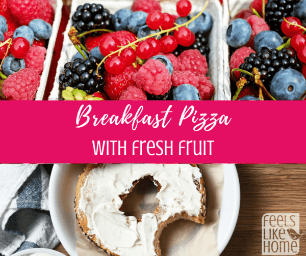 A bunch of different types of fruit and a bagel with cream cheese