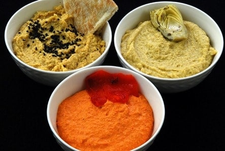 Three kinds of hummus on a tray