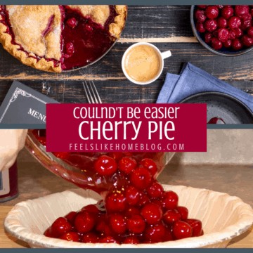 A pie with cherries on top of a wooden table