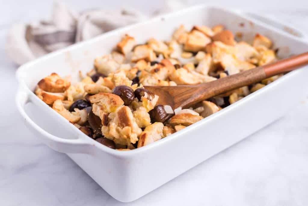 a casserole dish full of cooked chestnut stuffing