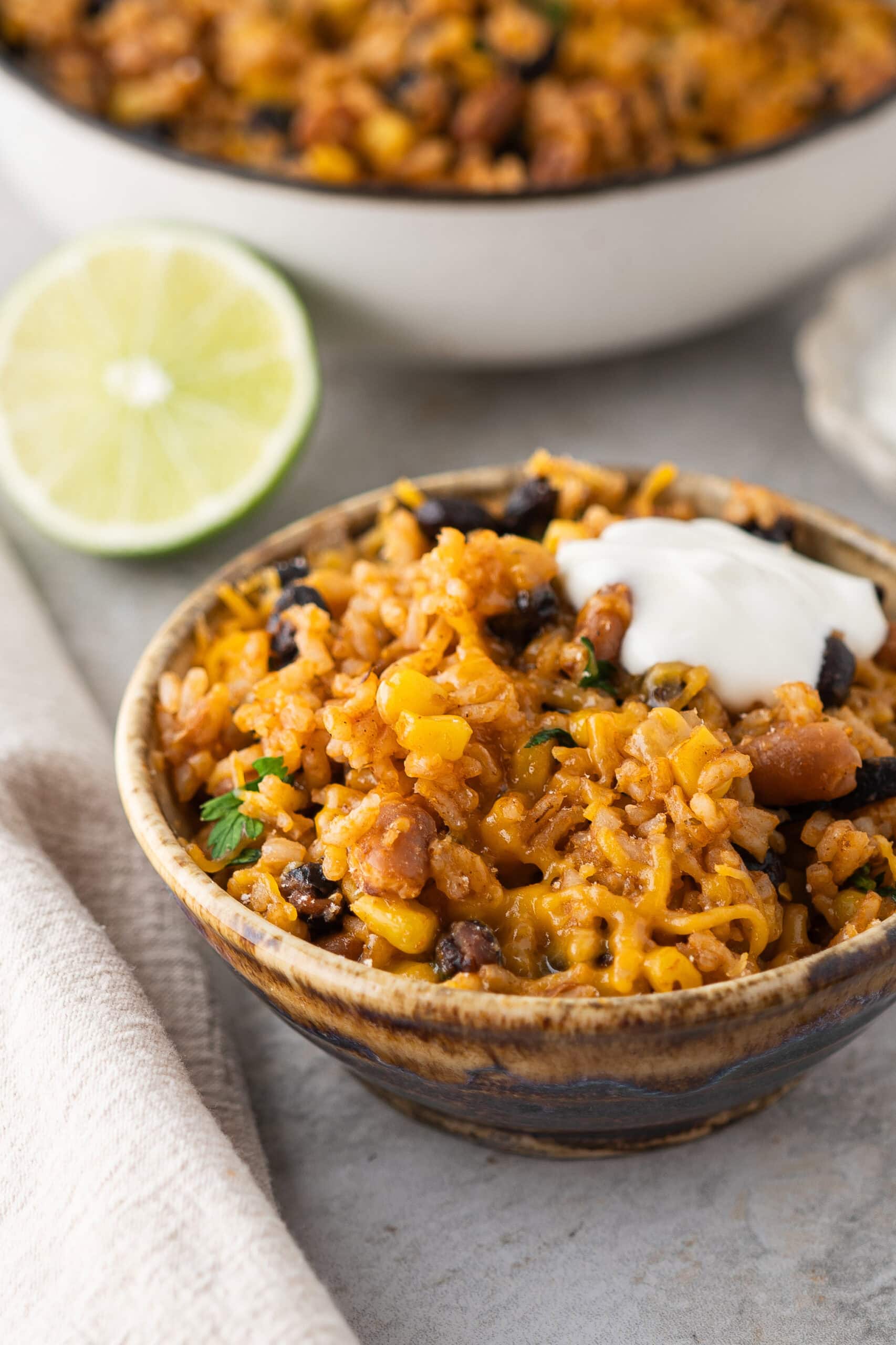 Mexican Beans and Rice all served up with sour cream ready to be enjoyed