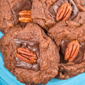 double chocolate pecan cookies on a blue plate
