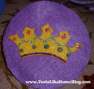 A felt Jesse tree ornament with a crown