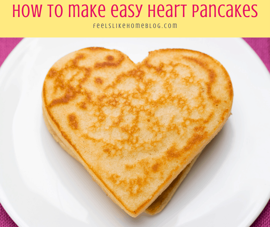 a heart shaped pancake on a white plate