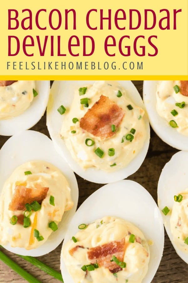 A close up of deviled eggs with bacon and cheddar cheese