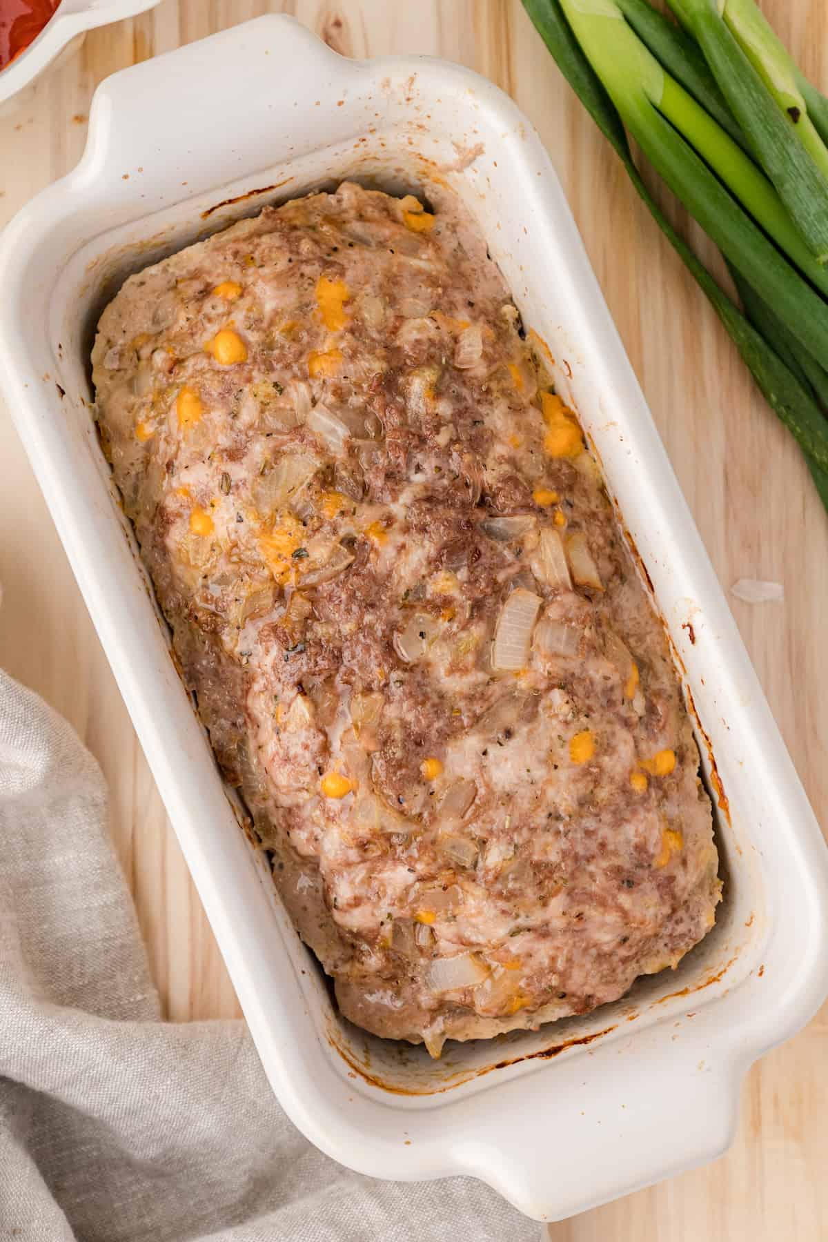 easy healthy meatloaf just out of the oven, before brushing on the ketchup mixture
