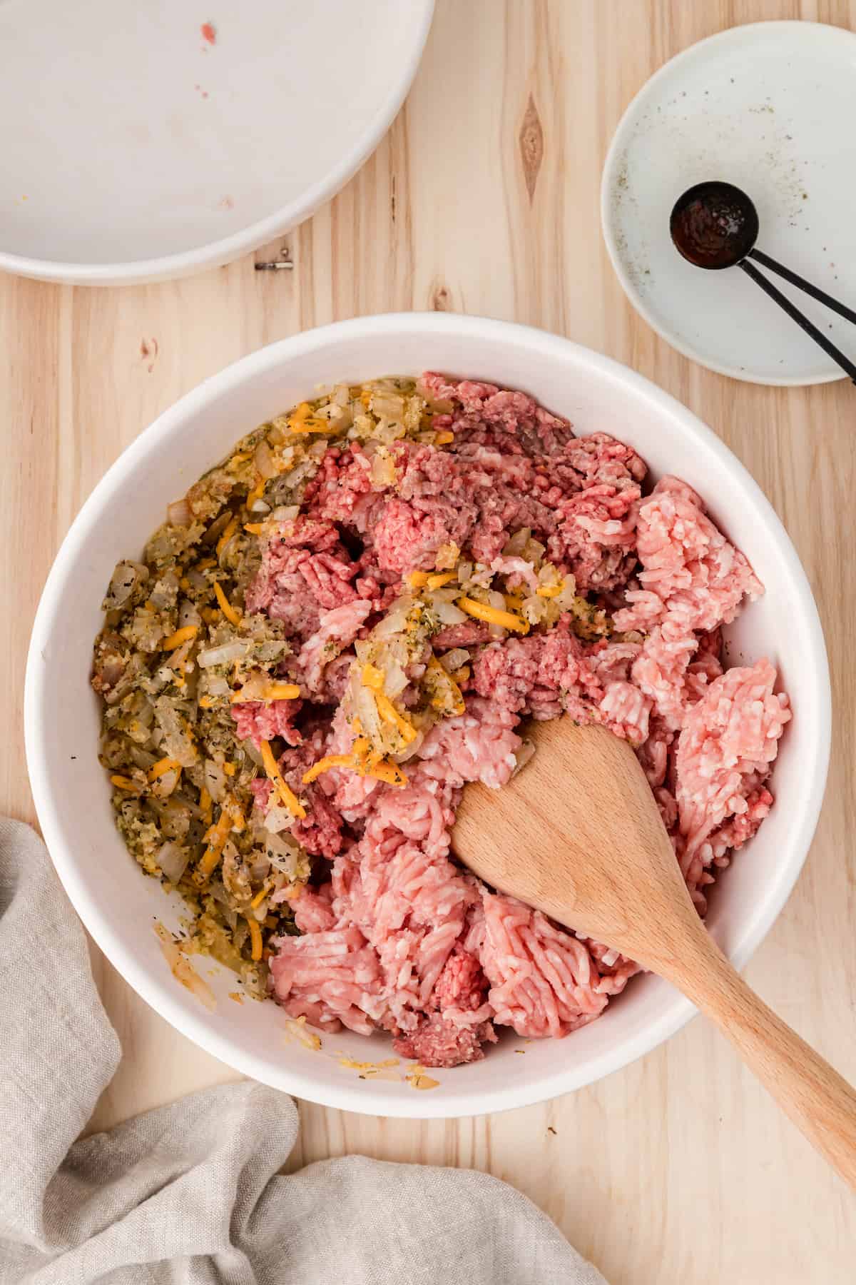 mix the breadcrumb mixture with the ground beef and ground turkey