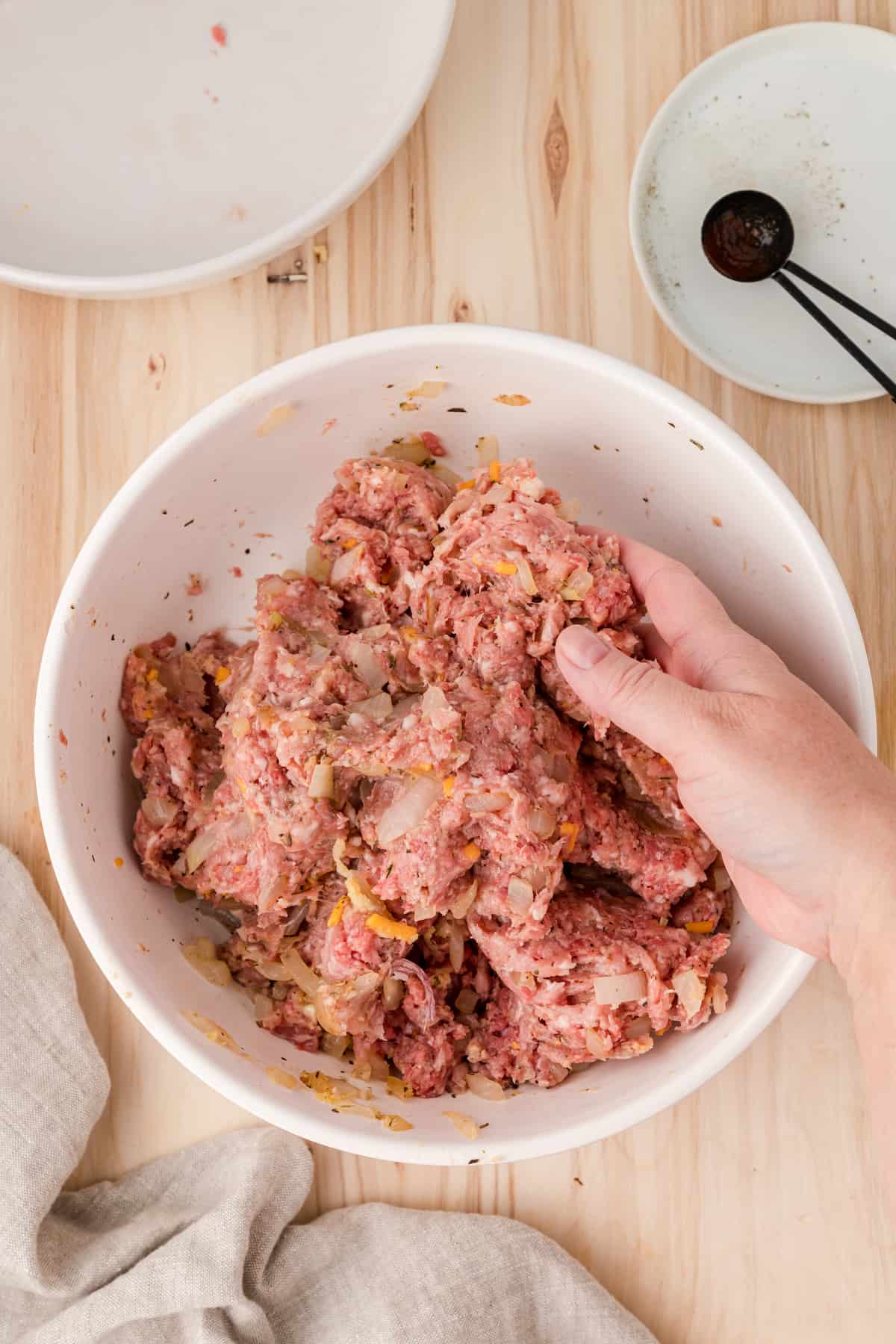 healthy meatloaf mixture in a white bowl