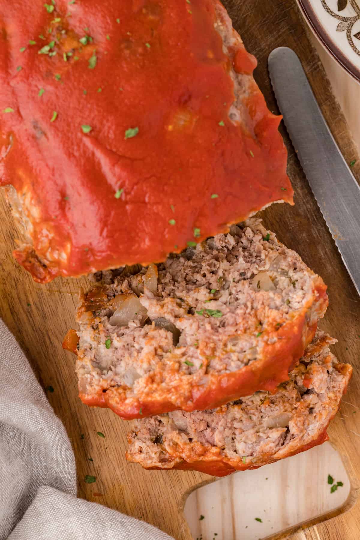 a close up of two slices of the best easy healthy meatloaf recipe