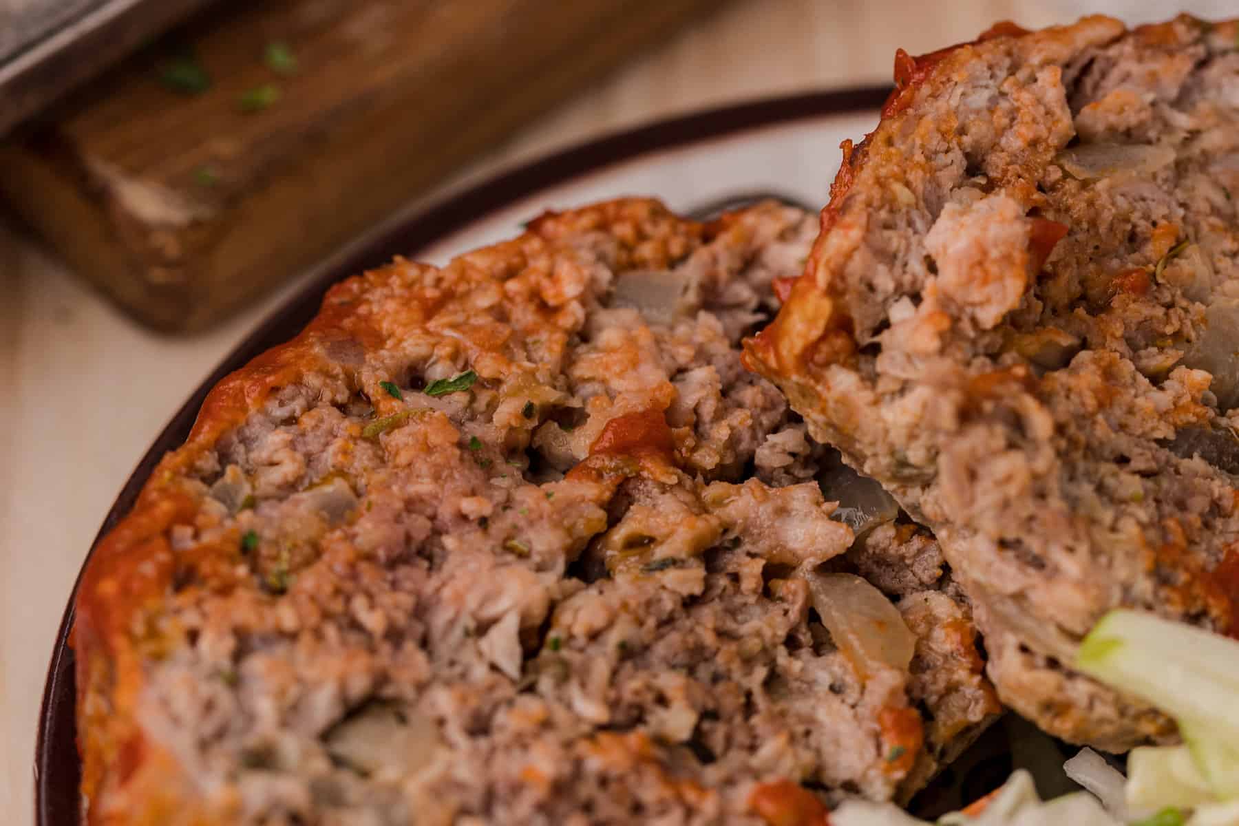 a close up of meatloaf on a plate