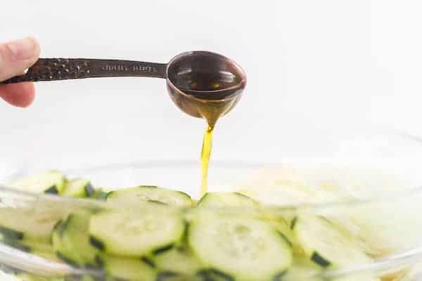 pour oil into the cucumbers and pasta