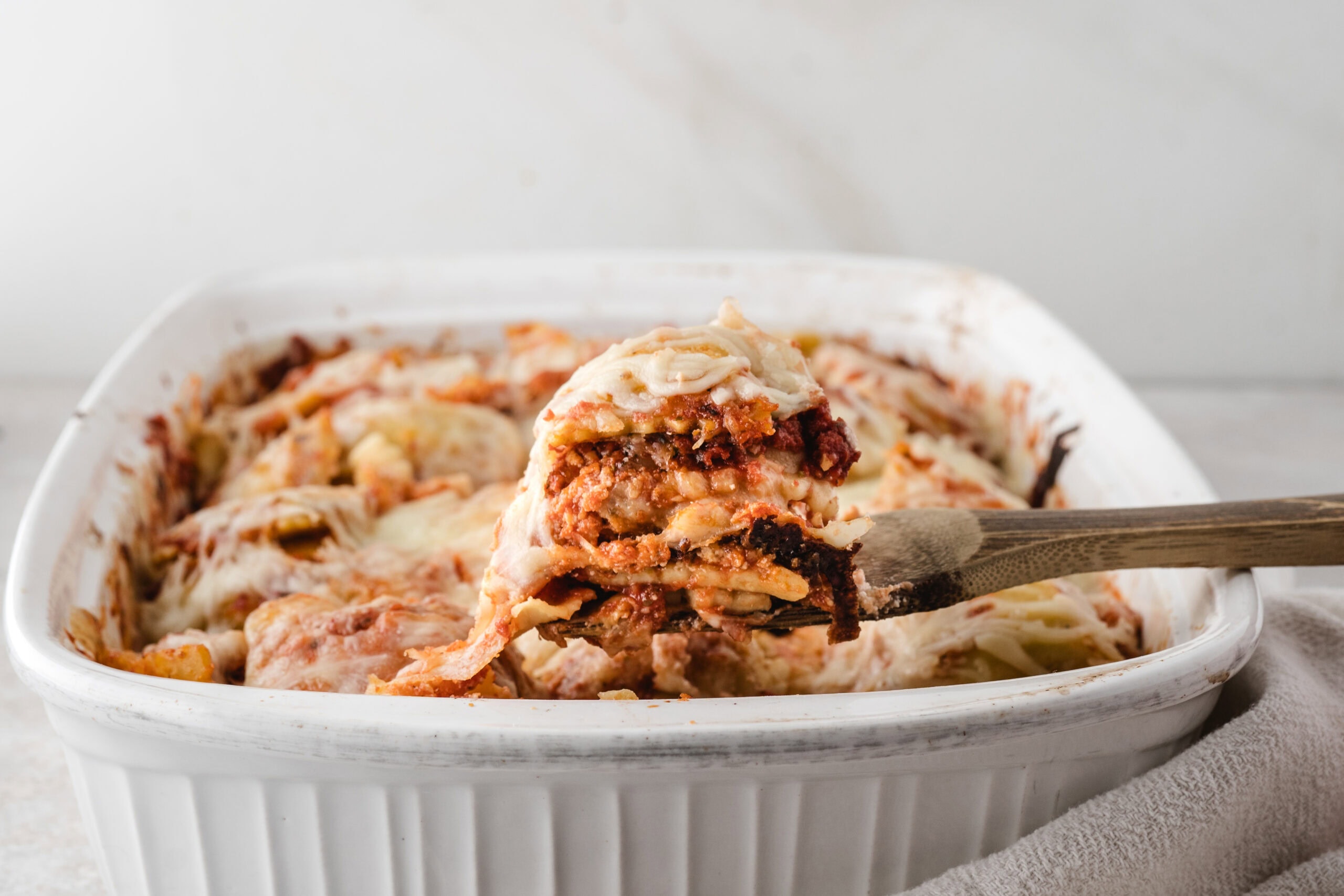 Baked Ravioli being served to a plate to enjoy