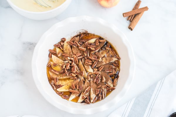 apples and pecans in the baking dish