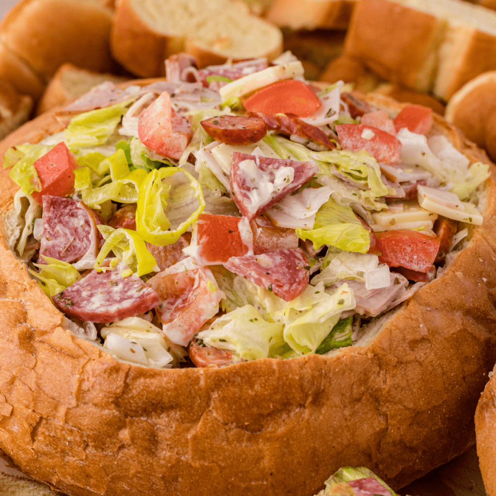 Italian hoagie dip in a bread bowl