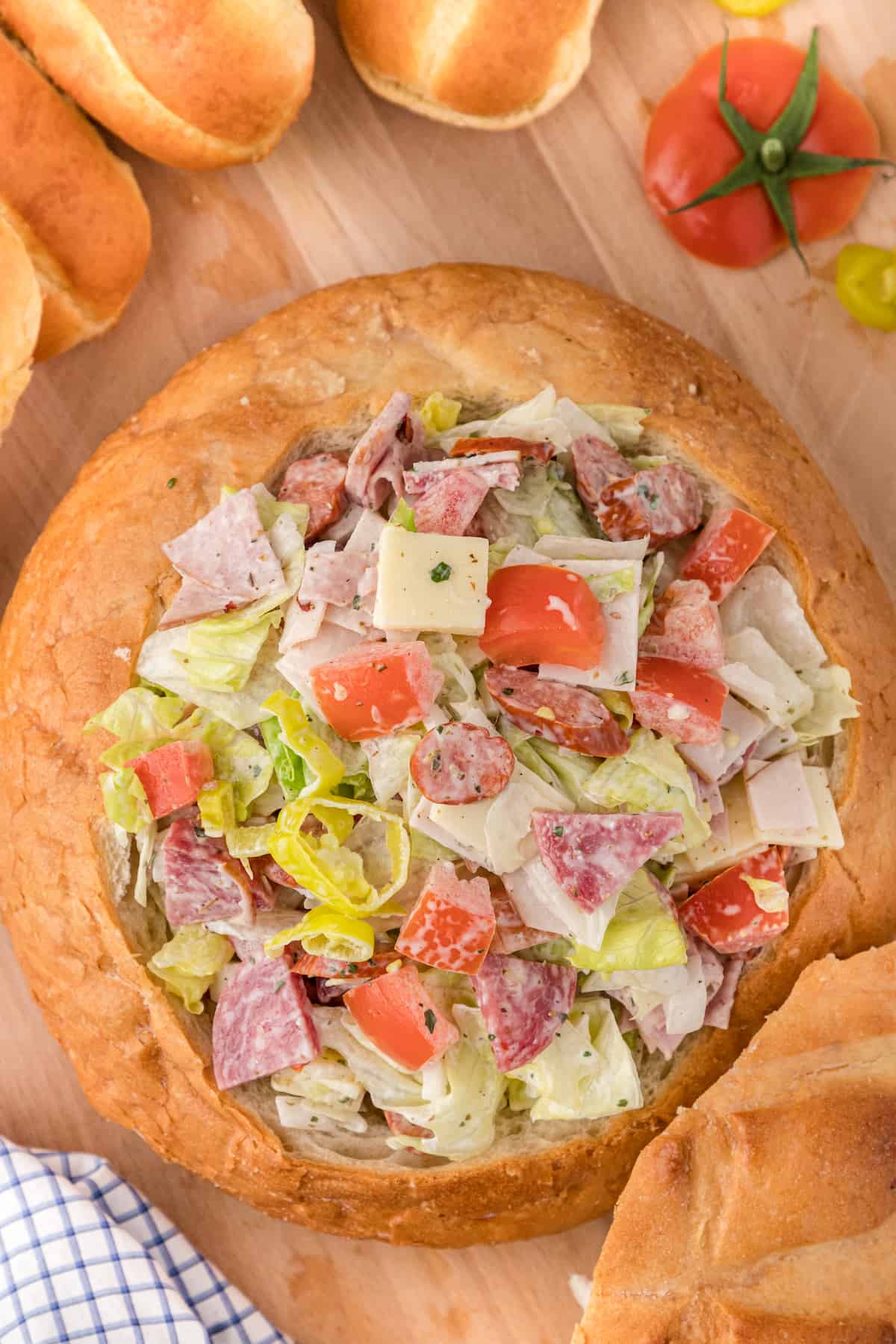 fill the bread bowl with the prepared dip
