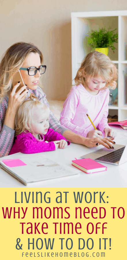a mom on the phone with two little girls on her lap