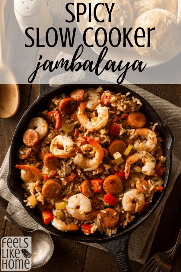 A pan filled with food, with Rice and Jambalaya, sausage and shrimp