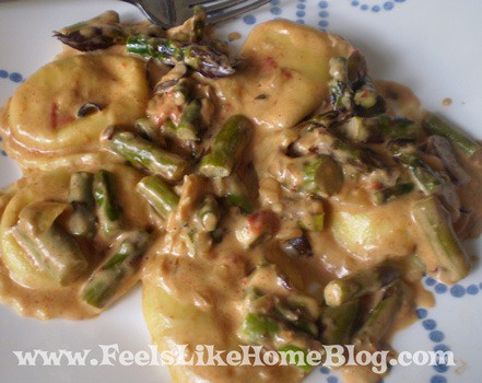 ravioli alfredo with asparagus and mushrooms