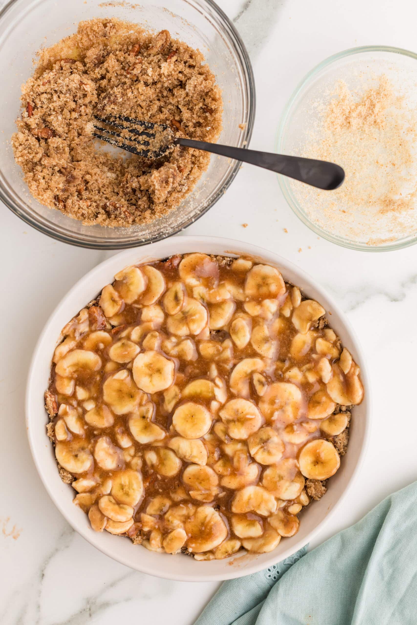 Homemade banana crumble with layered banana filling