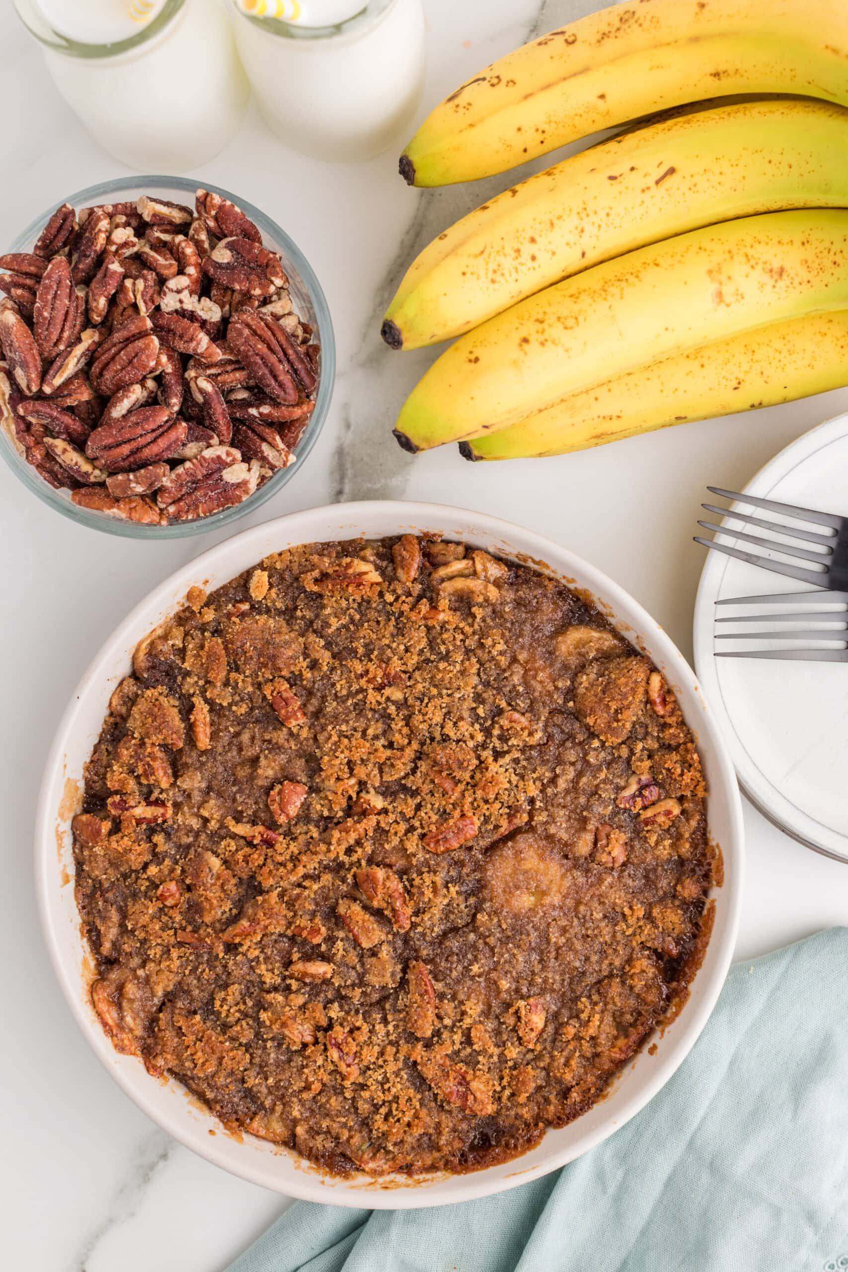 Baked banana cobbler with golden pecan crumble topping