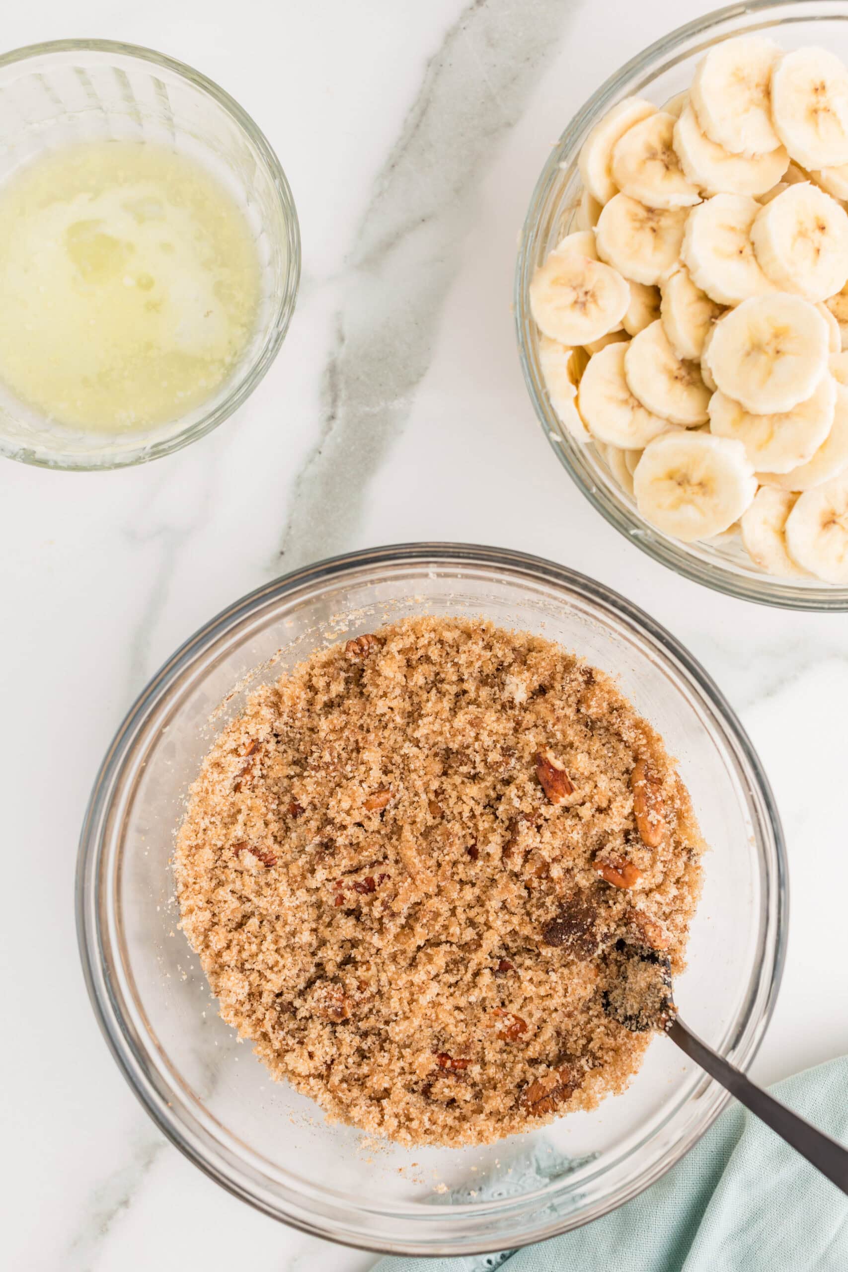 Homemade banana cobbler pecan crumble topping mixture