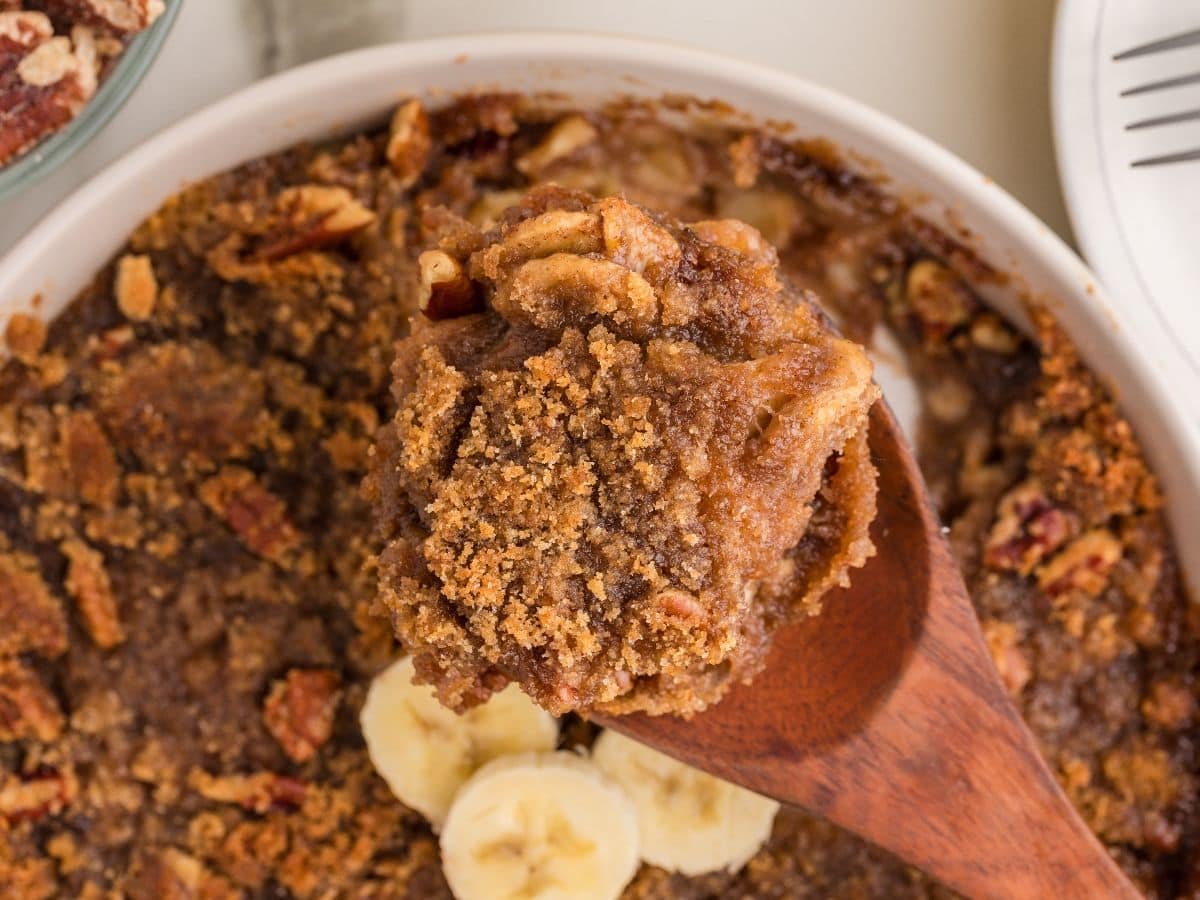 Warm banana cobbler with crunchy pecan topping
