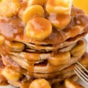 a close up of bananas foster pancakes