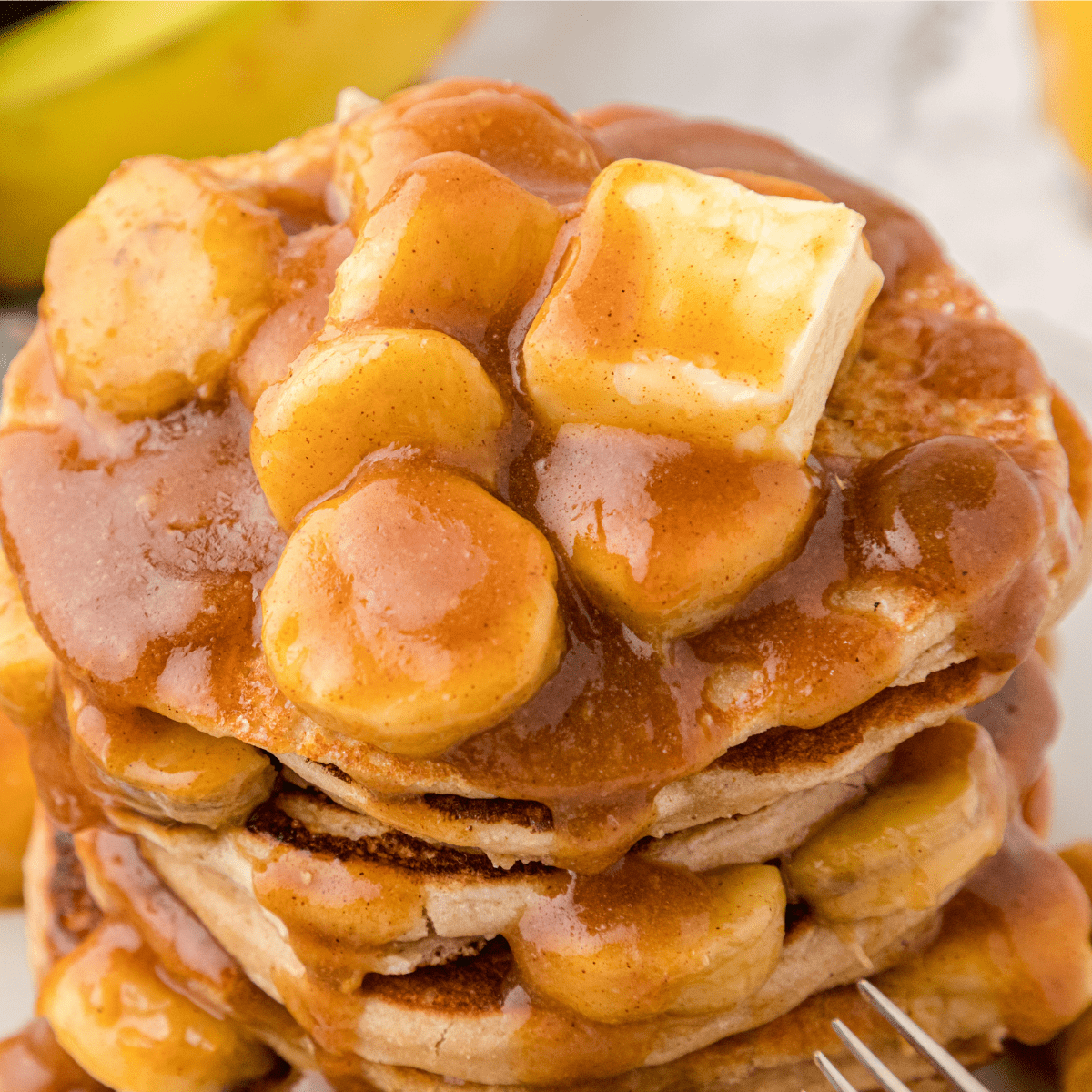 a closeup of bananas foster pancakes