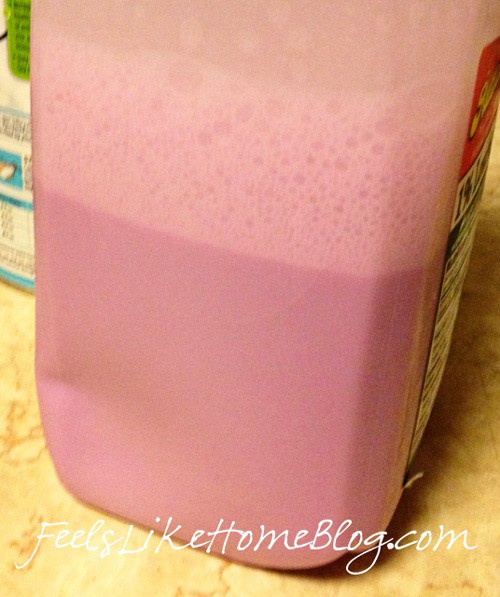 A jug of milk dyed purple