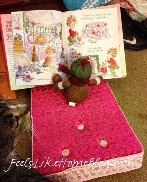An elf reading a book