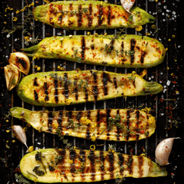 zucchini on a grill with spices