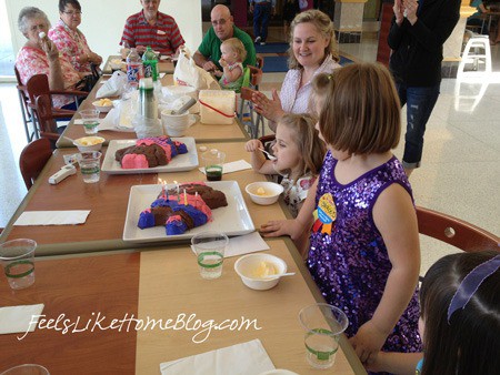 A group of people sitting at a table