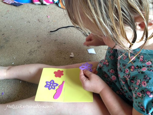 Preschoolers peeling stickers