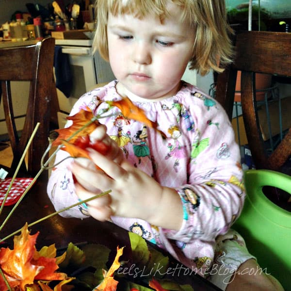 Remove flowers and leaves from plastic stems - Autumn Wreath Craft for Kids