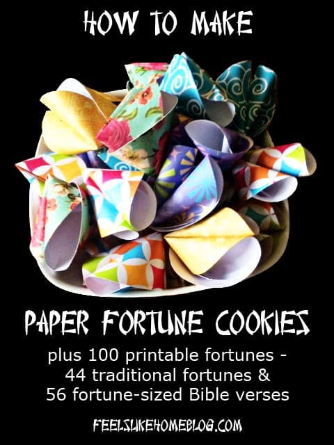 a bowl of paper fortune cookies