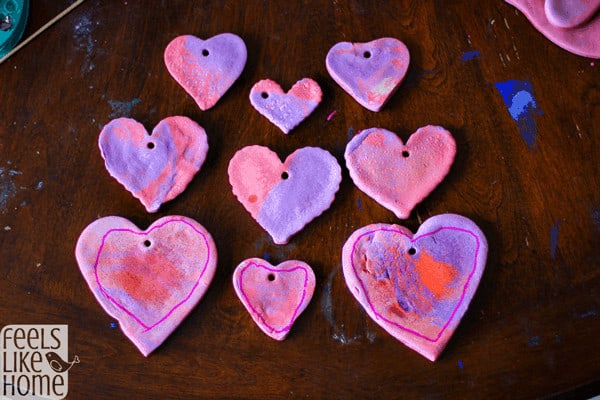 Nine colored salt dough hearts in various sizes