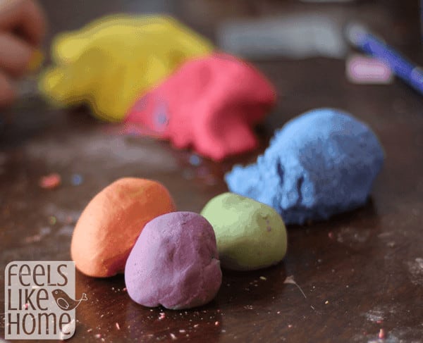 A close up of homemade play dough in many colors