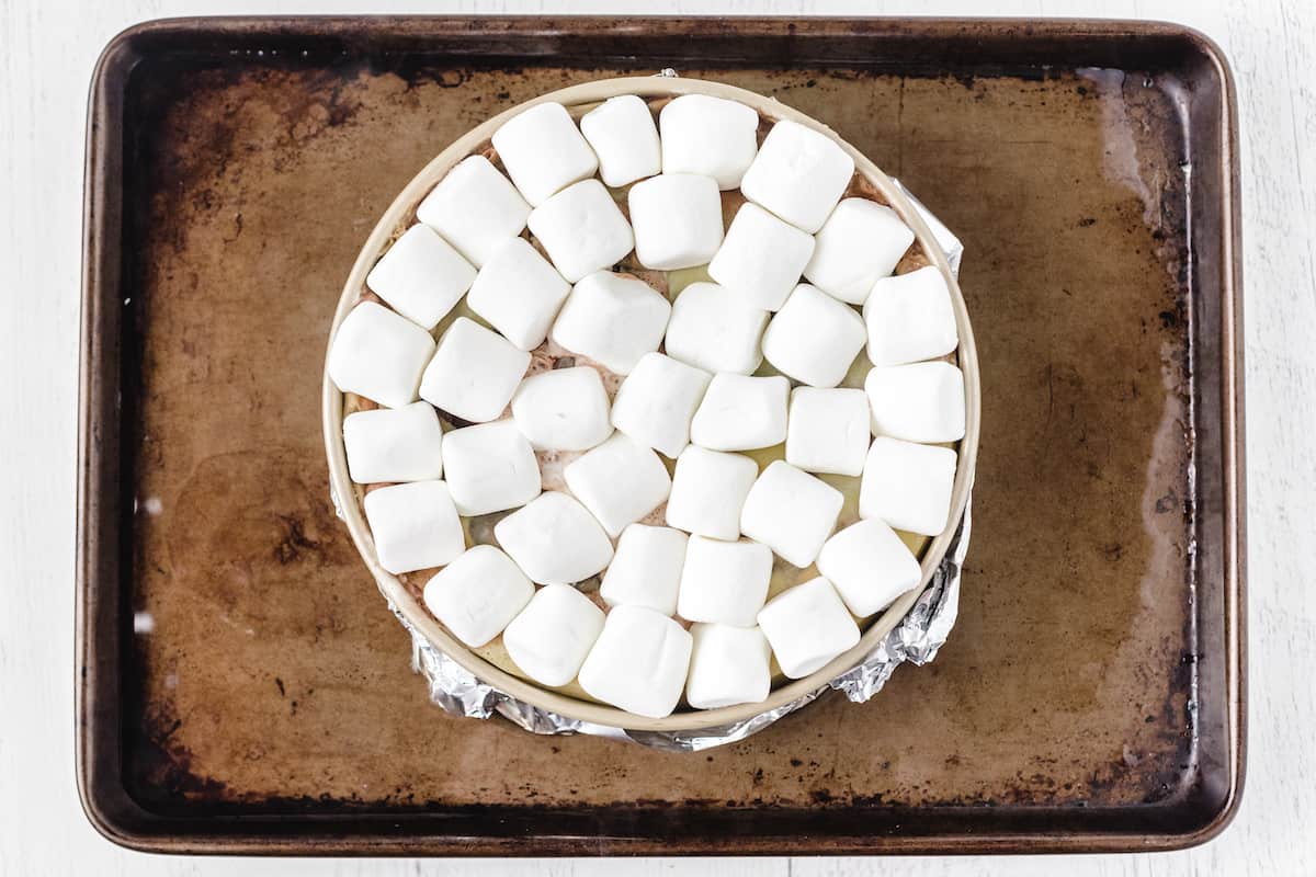 top the cheesecake with marshmallows