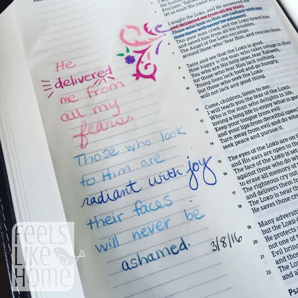 A close up of Bible journaling on a white background