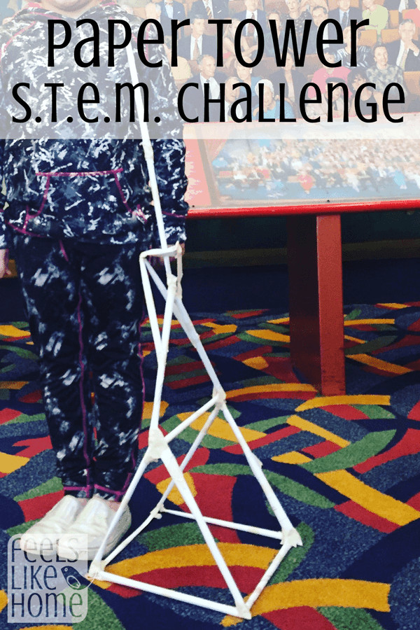 a paper tower with a little girl and the title "paper tower STEM challenge"