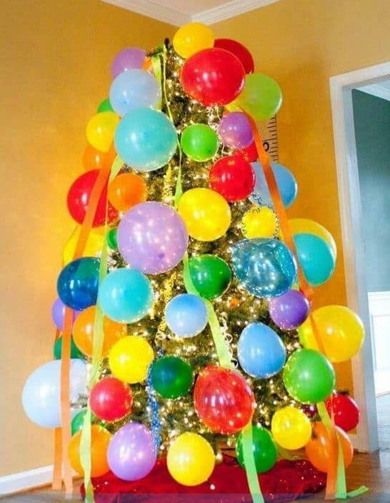 A Christmas tree decorated for a birthday