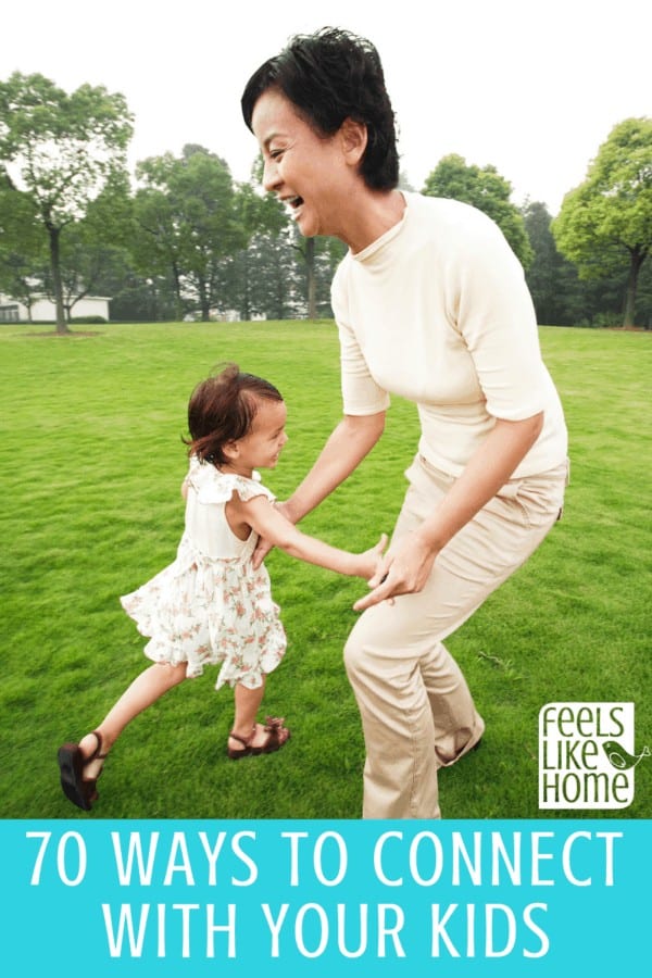 A mom dancing with her small daughter