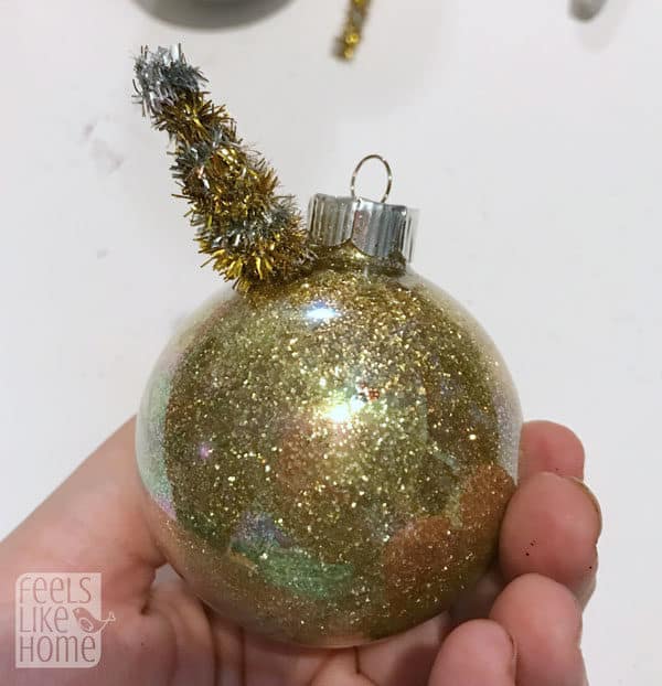 Glue the horn on the ornament