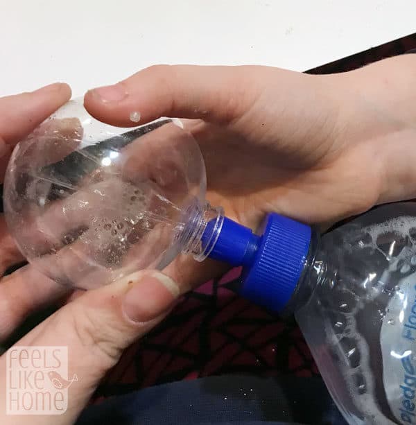 Squeeze floor cleaner into the glass balls